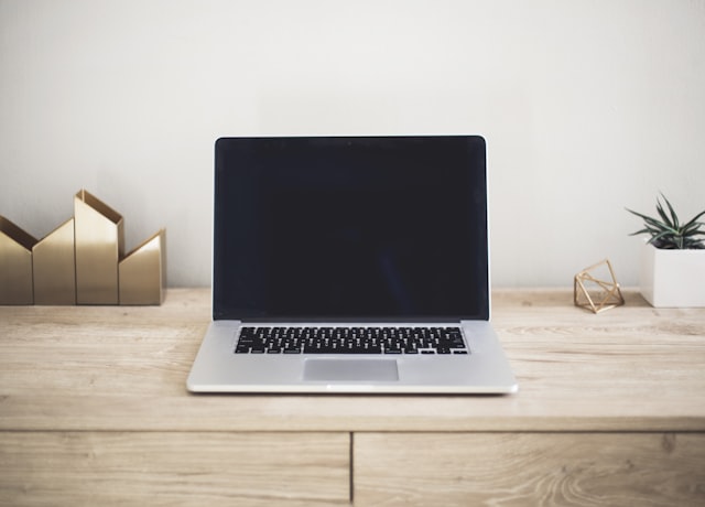 Laptop with smartphone on a desk